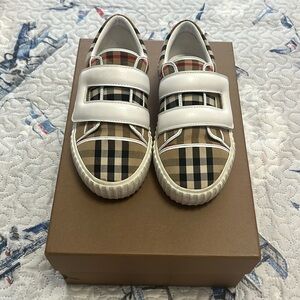Gently worn Burberry boys one strap sneakers.